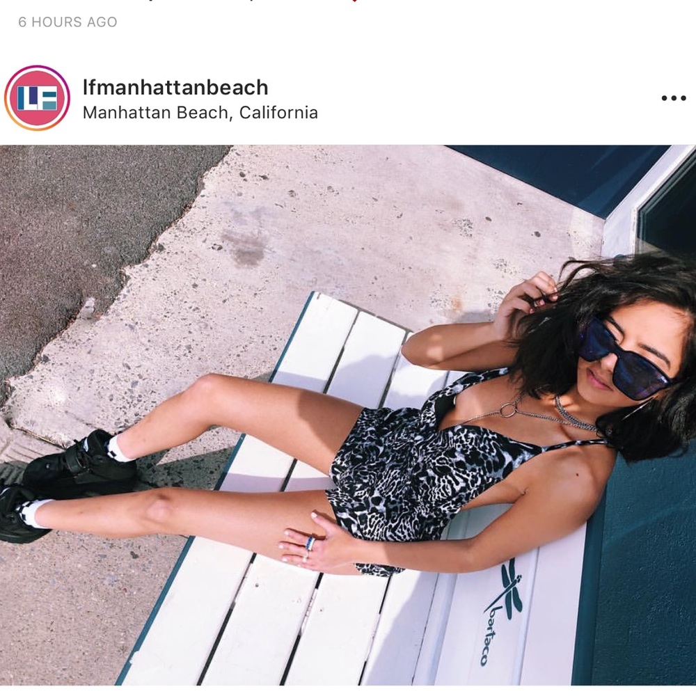 Romper with a connected chain choker